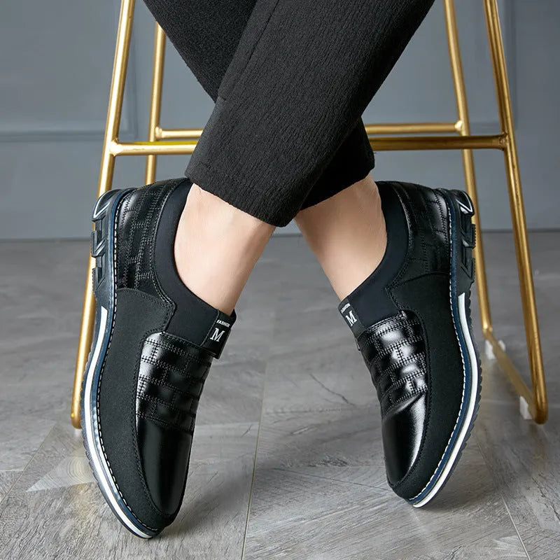 Men's casual leather shoes in black, blue, and brown colours showing low-cut design