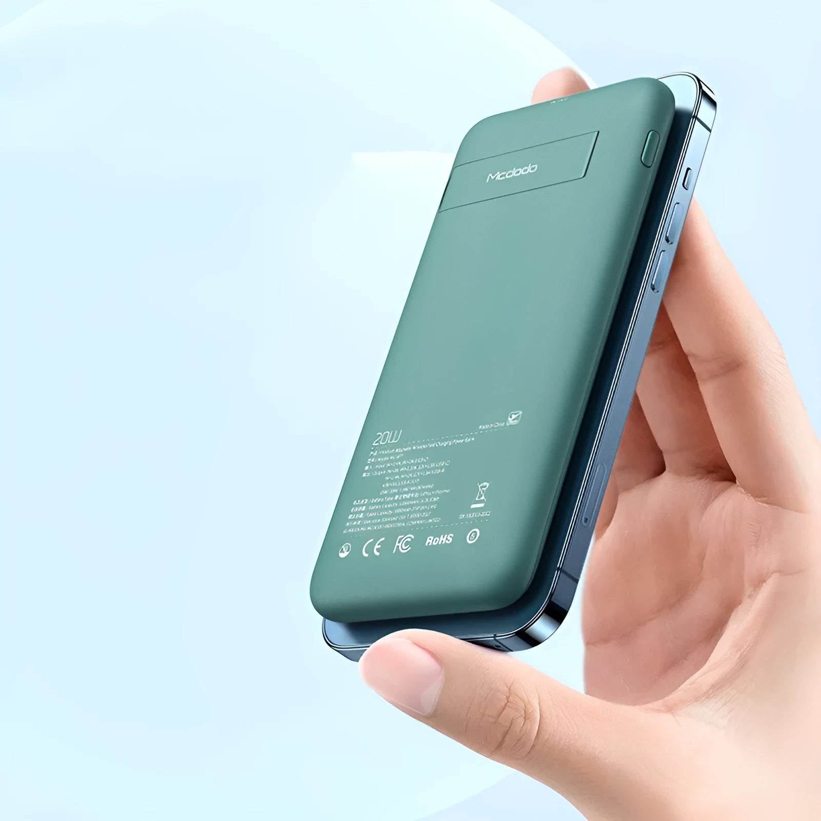 Mint green MagSafe-compatible magnetic wireless power bank with back clip showing dimensions