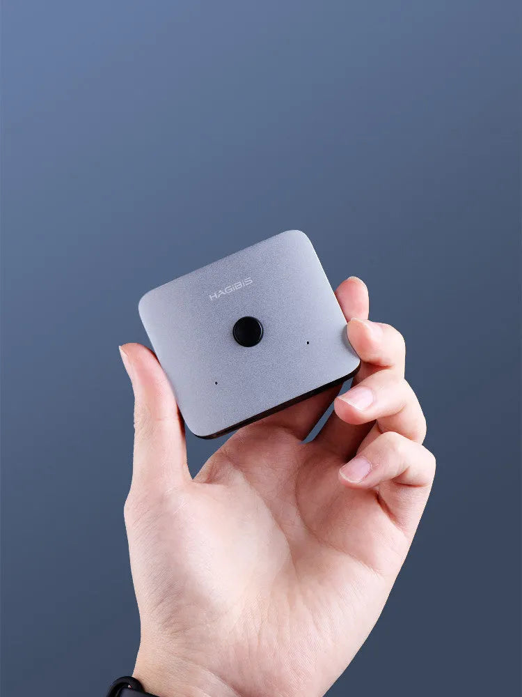 Grey Haibeisi HDMI switcher with two input ports and one output port for 4K video transmission
