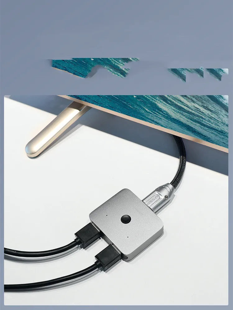 Grey Haibeisi HDMI switcher with two input ports and one output port for 4K video transmission