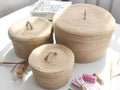 Japanese style fabric storage basket with dustproof lid in small, medium, and large sizes.