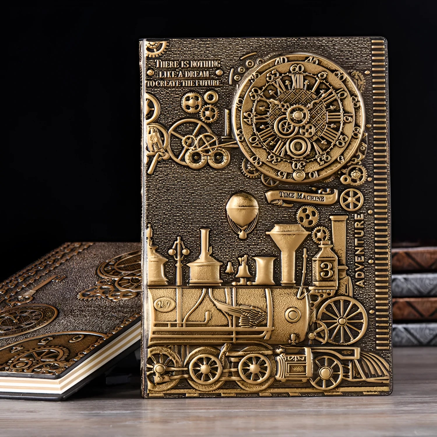 Retro embossed A5 notepad diary in metallic bronze or silver finish with leather-mounted cover