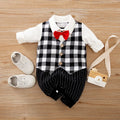 Gentleman-style cotton baby jumpsuit for boys in navy blue with long sleeves.