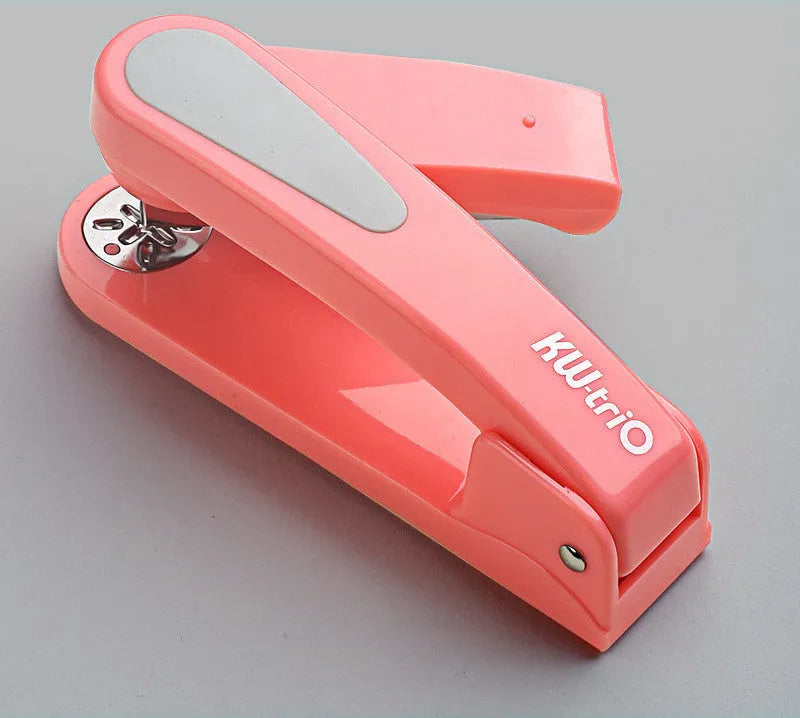 360-degree rotatable desk stapler in multiple colours showing binding directions and centre seam function.