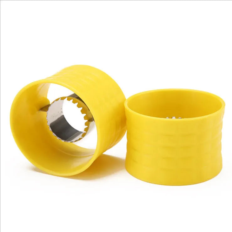 Yellow manual corn grinder thresher with a corn-kernel shaped PP handle and stainless steel peeling gear.
