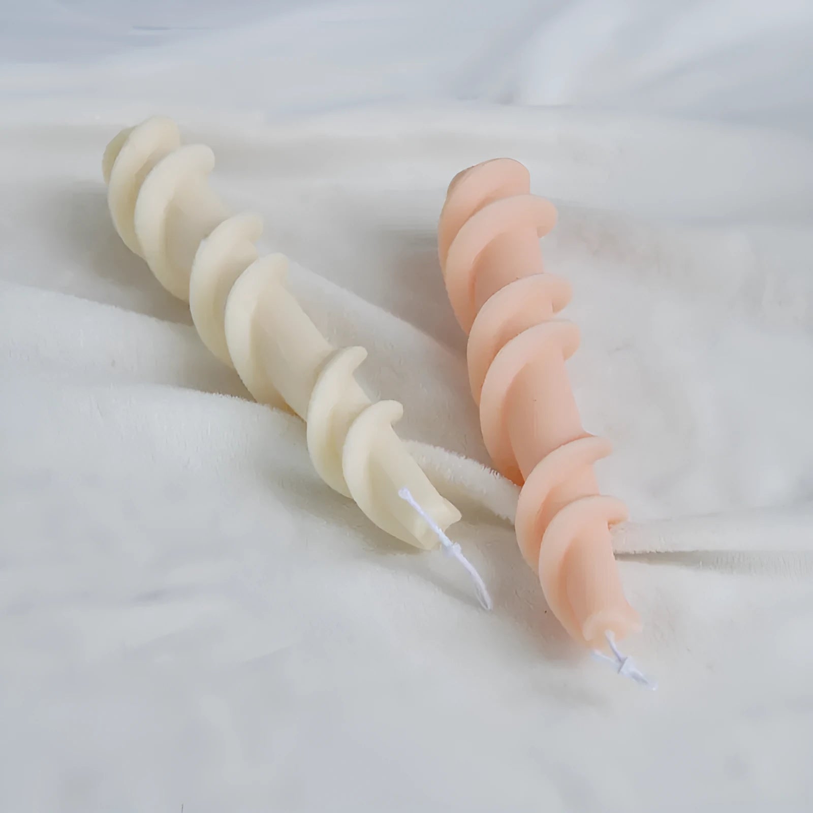 Handmade silicone mould for making spiral lace decorative pillar candles.