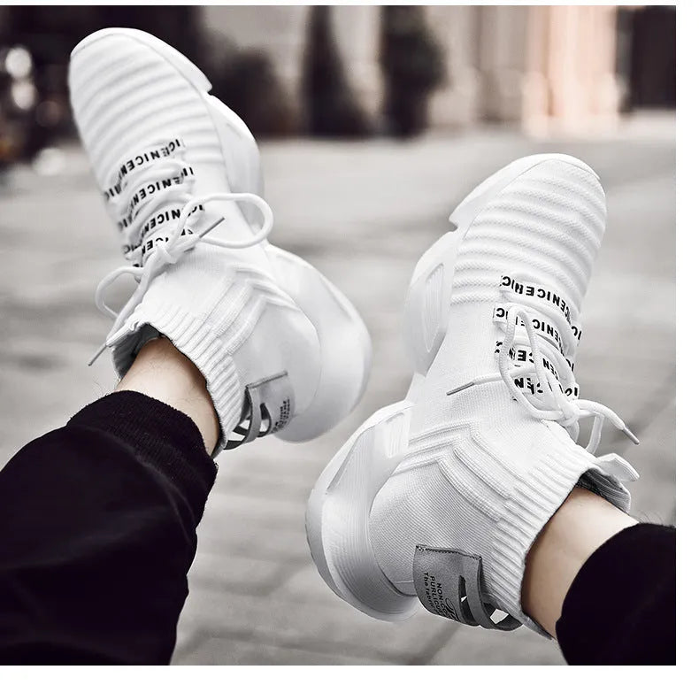 Men's black and white casual sports shoes with mesh lining available in sizes 39-47