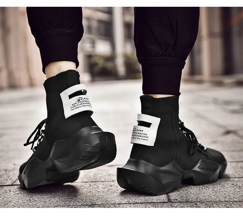 Men's black and white casual sports shoes with mesh lining available in sizes 39-47