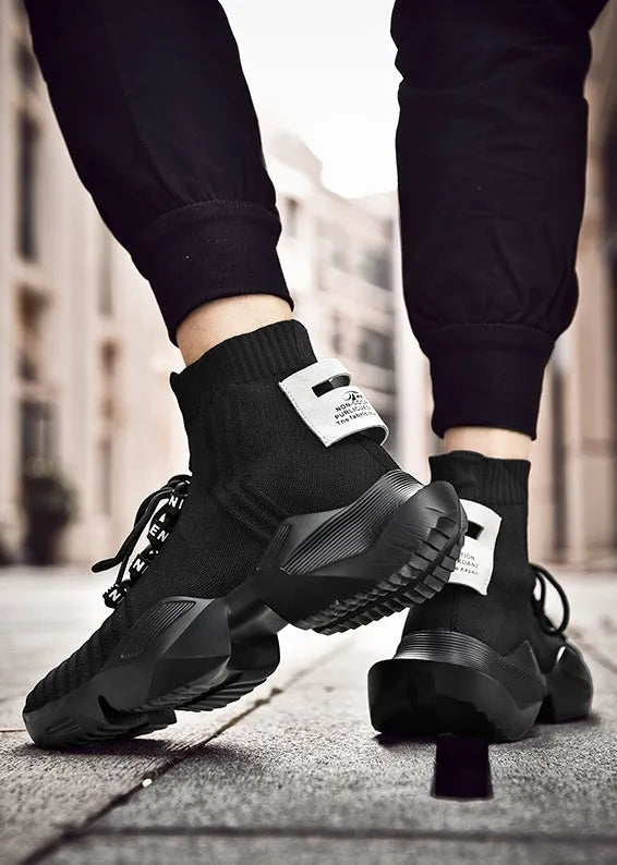 Men's black and white casual sports shoes with mesh lining available in sizes 39-47