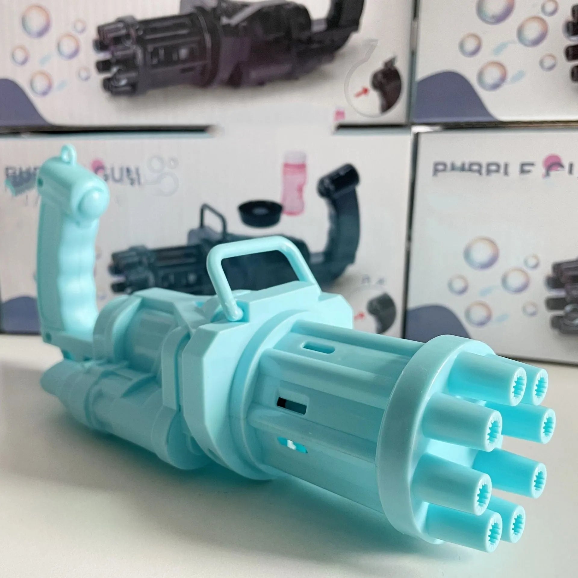 Kids plastic bubble machine gun toy in pink, gold or black colour with trigger.