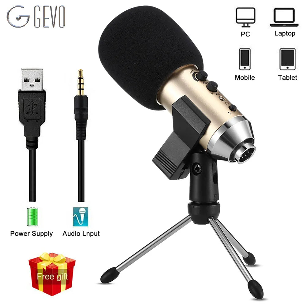 Gold coloured USB condenser microphone with bracket on a desk.