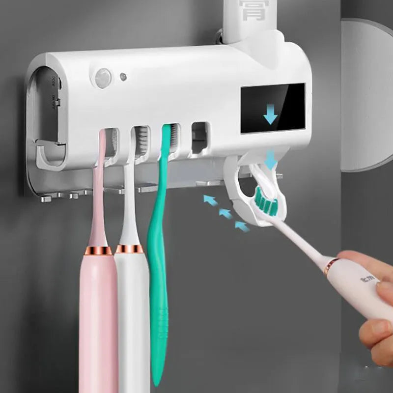 Wall-mounted UV toothbrush sterilizer with automatic toothpaste squeezer in black finish