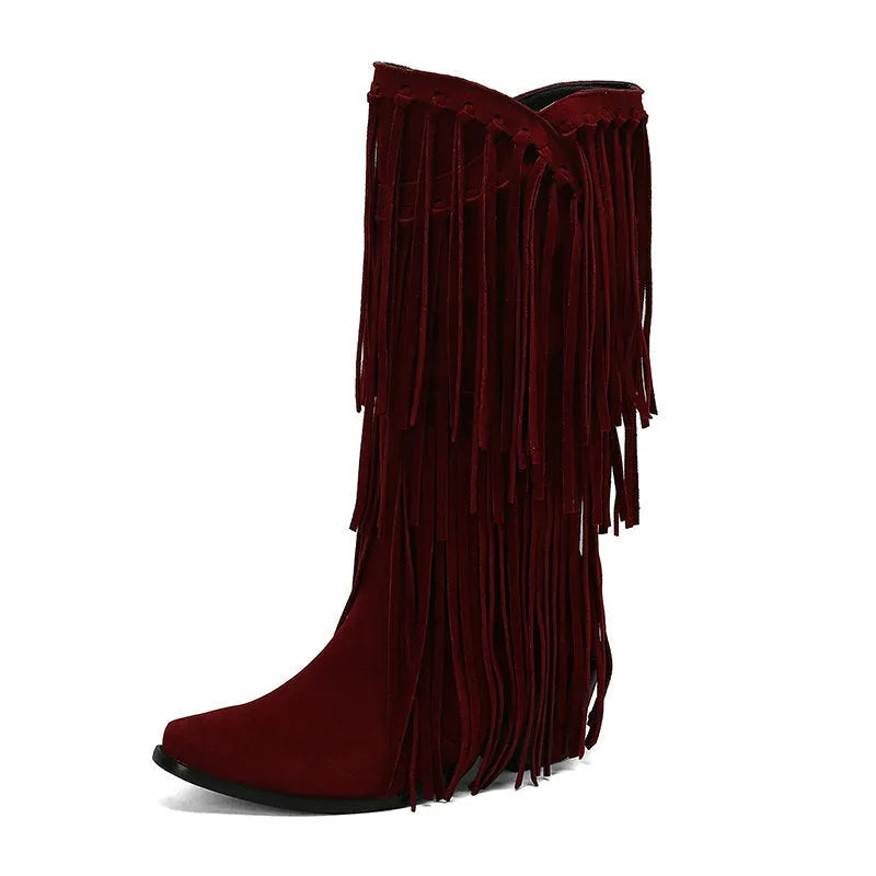 Women's beige suede knee-high boots with tassel, chunky heel, and square toe on a waterproof platform.