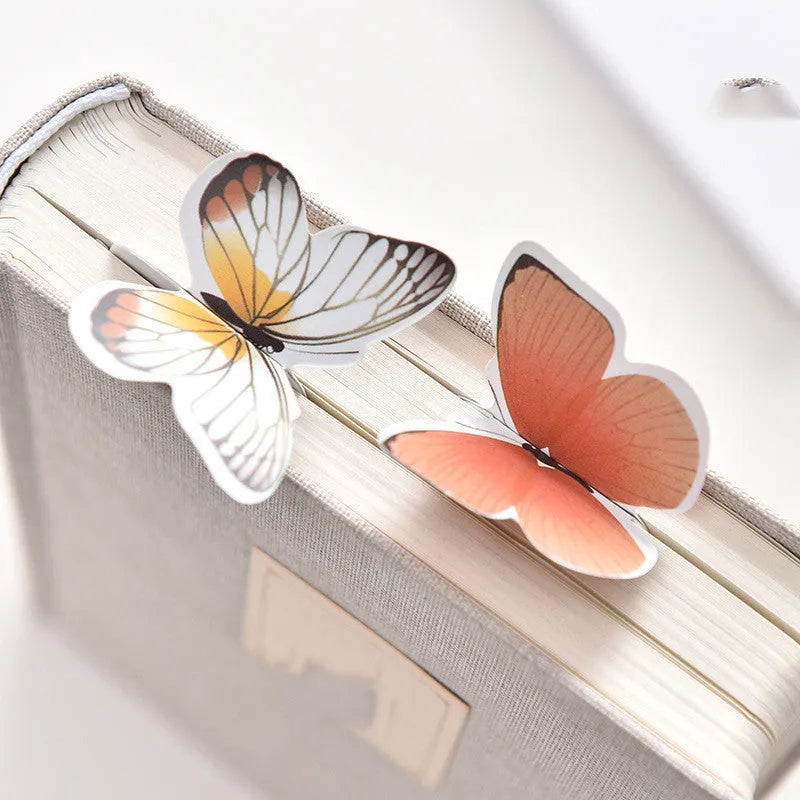 Butterfly-shaped paper bookmark with 13.5cm by 5.5cm dimensions for stationery and gifting