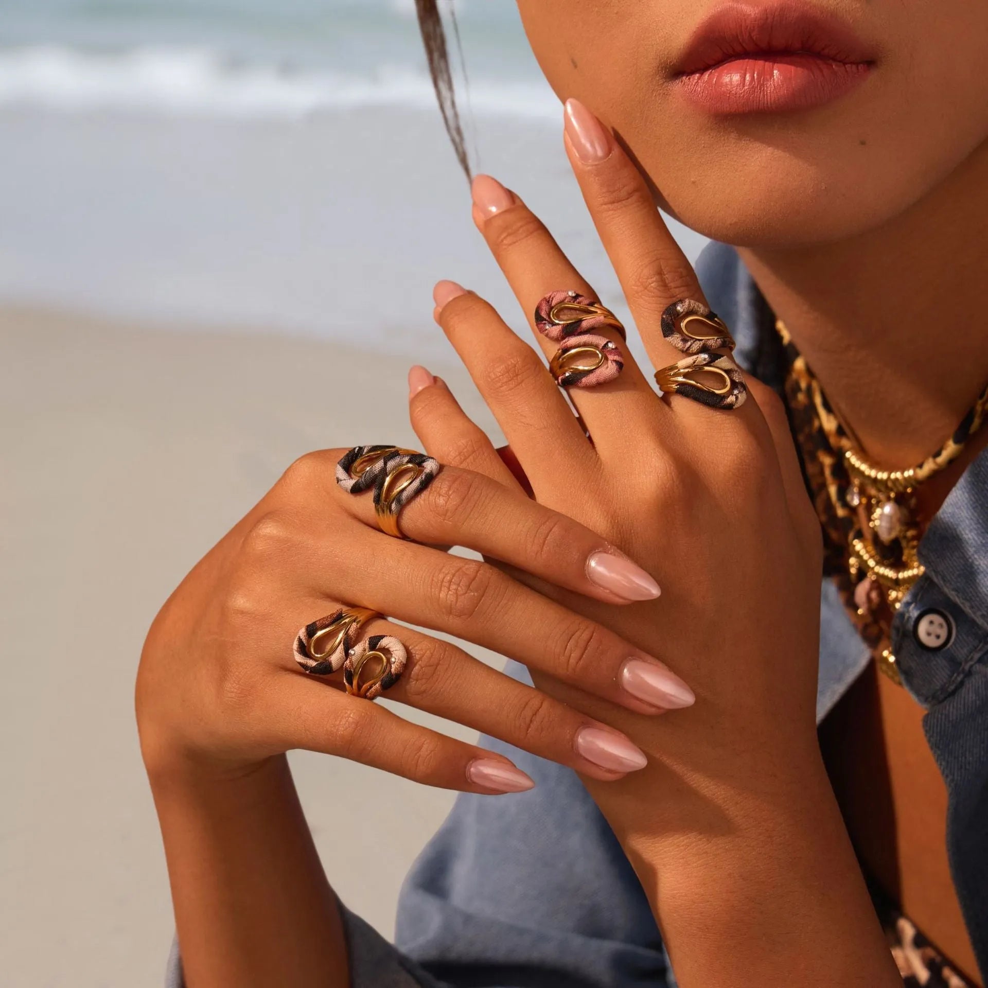 Leopard print stainless steel open mouth ring in heart, star, or geometric shape.