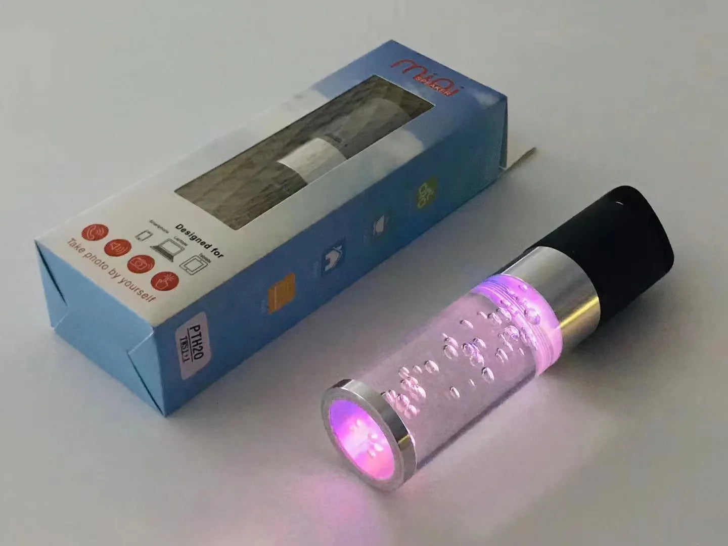 Portable Bluetooth speaker with colourful crystal lighting in compact design