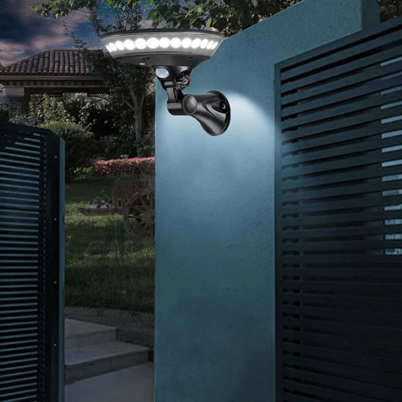 White 360-degree solar garden light with integrated solar panel on top