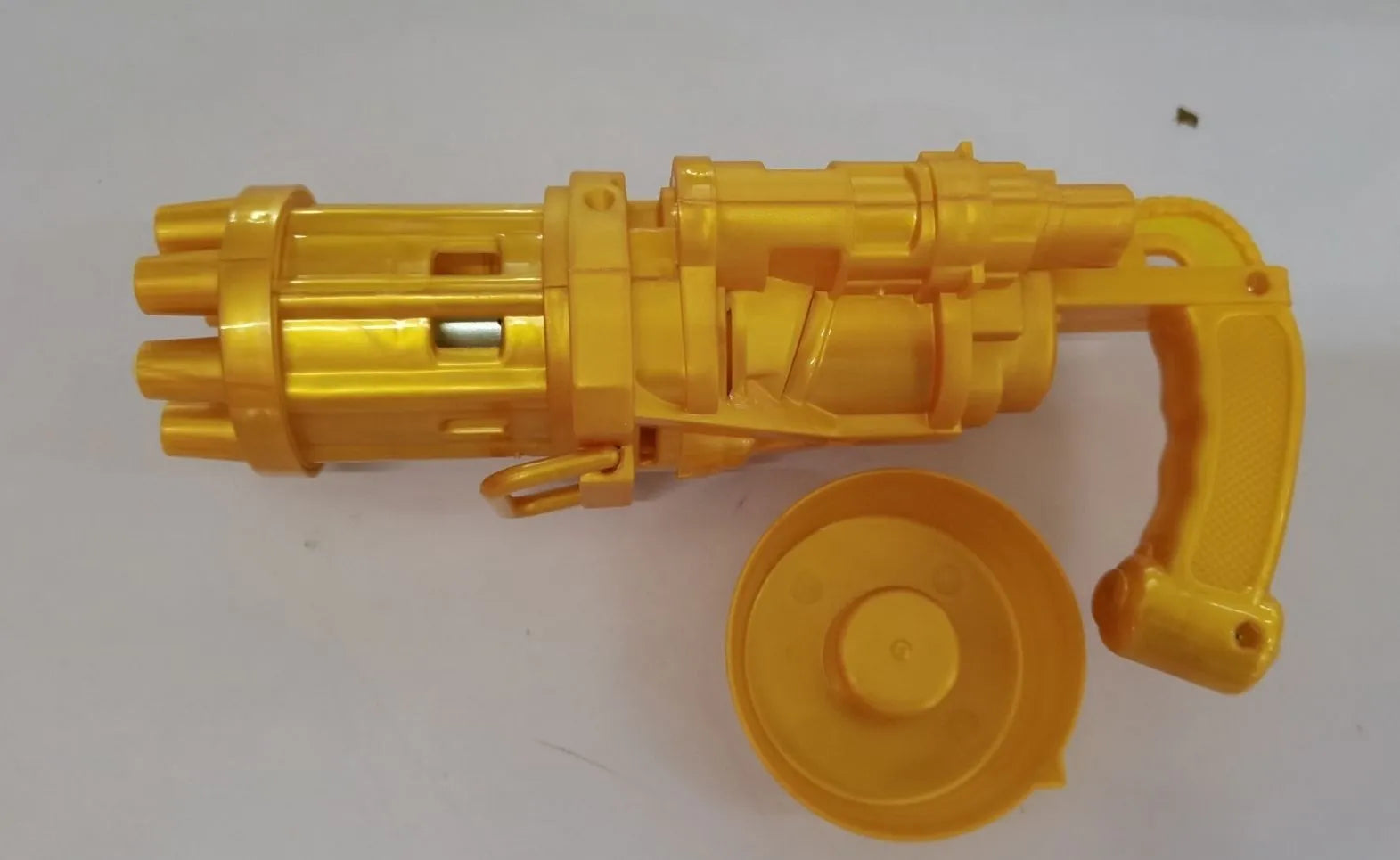 Kids plastic bubble machine gun toy in pink, gold or black colour with trigger.
