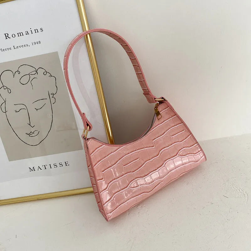 Women's small square underarm bag in PU leather, shown in multiple colour options including leopard print.