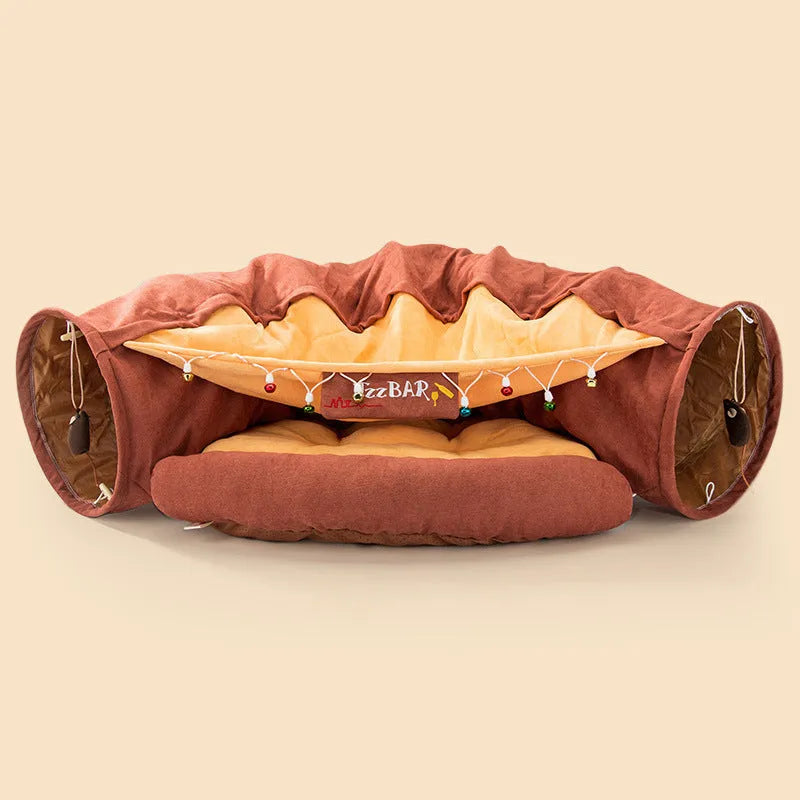 Collapsible cloth cat tunnel toy in pink, shown folded flat and opened for play