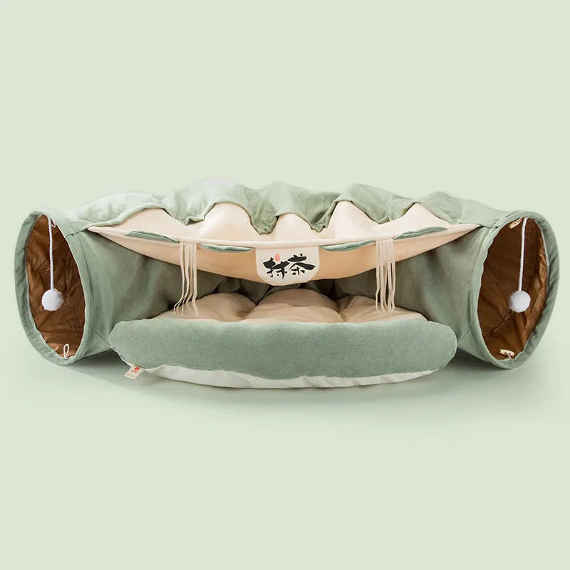 Collapsible cloth cat tunnel toy in pink, shown folded flat and opened for play