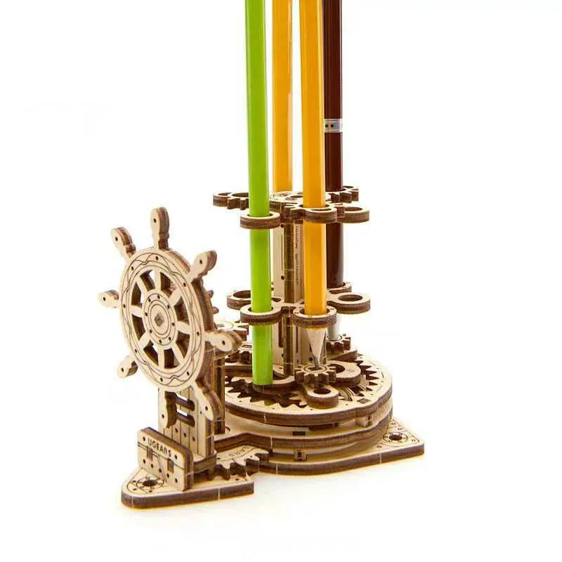 Ukrainian wooden rotating pen holder model with steering wheel on desk