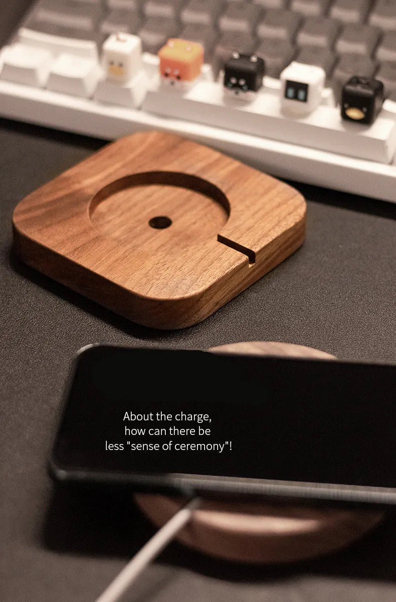 Walnut wood magnetic wireless charging base with MagSafe bracket on desktop