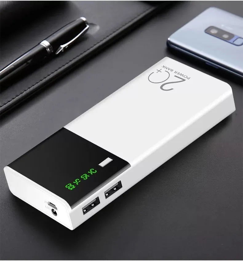 Black 20000mAh power bank with charging cable, dimensions 135mm by 60mm by 20mm
