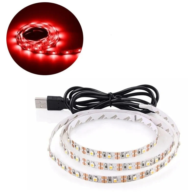 USB-powered LED light strip on a reel showing multiple colour options including white, blue, and red.