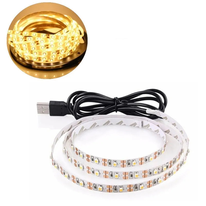 USB-powered LED light strip on a reel showing multiple colour options including white, blue, and red.