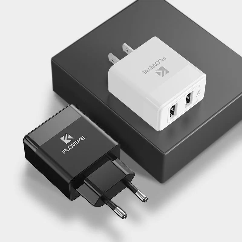 Black and white USB travel charger with European and American plug pins for international phone charging