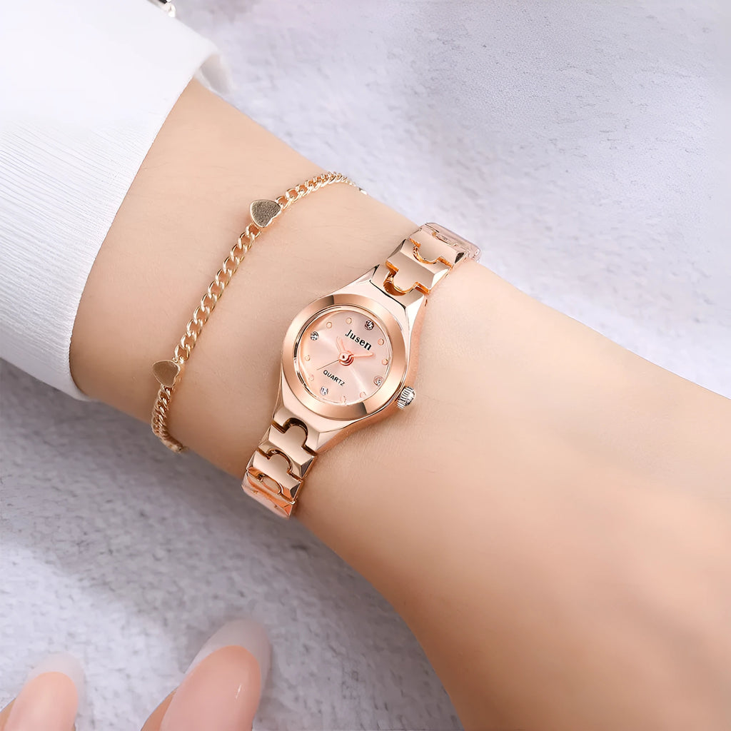 Small fine quartz ladies bracelet watch with round alloy case and stainless steel horseshoe buckle