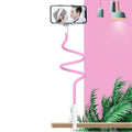 Blue memory alloy mobile phone holder with universal clamp attached to bedside frame