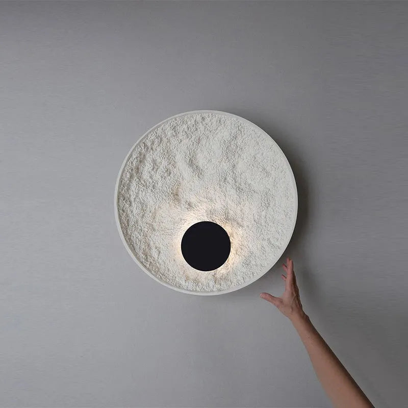 White modern iron wall light shown in 300mm and 500mm size options for bedroom use.
