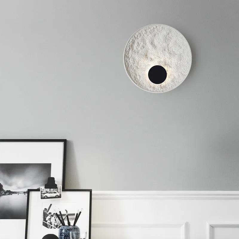 White modern iron wall light shown in 300mm and 500mm size options for bedroom use.