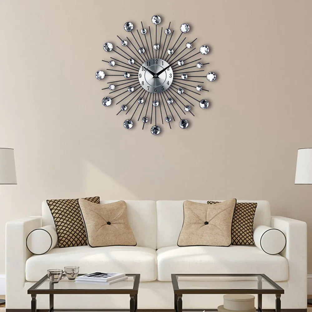 Large silver round wall clock with aluminium dial on a wall