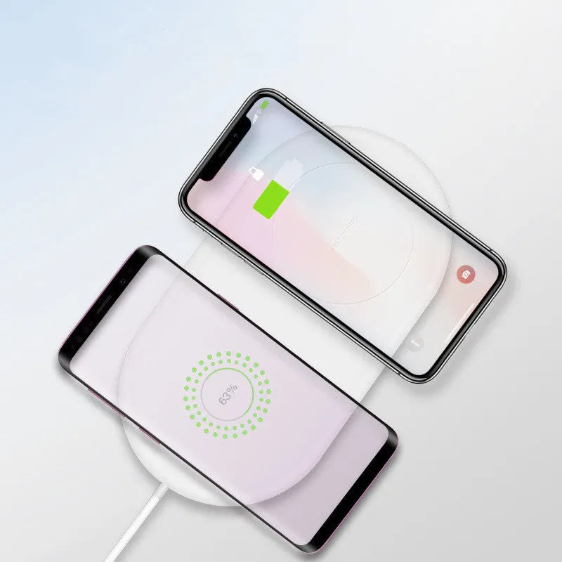 White dual wireless charger for two mobile phones with fast charging support