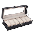 Black wooden watch display box with clear window showing six compartments for watch storage