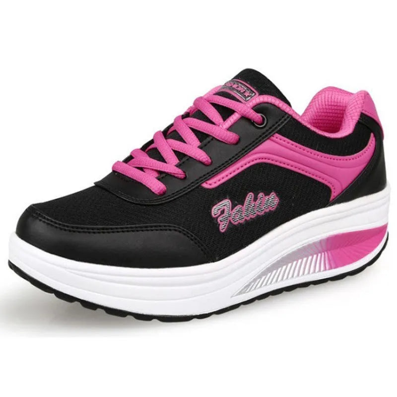 Women's grey powder travel sports shoes with a 3-5cm mid-heel on a neutral background.