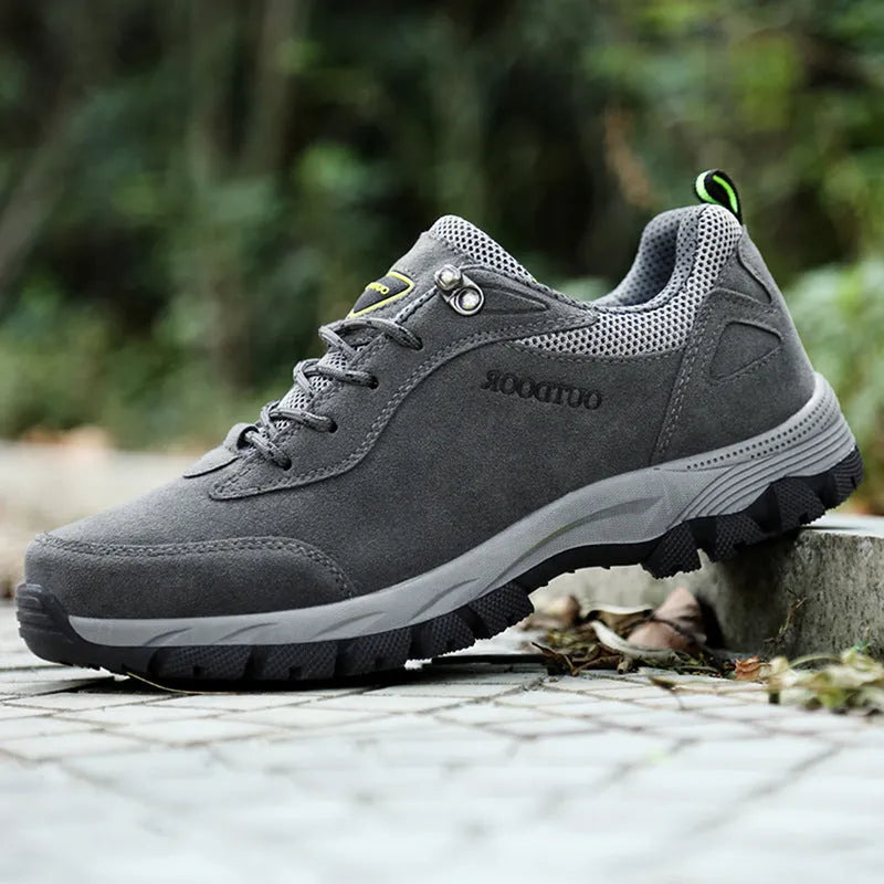 Men's low-top hiking shoes in army green with mesh lining, shown from the side.