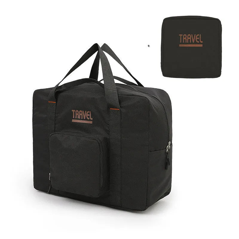 Black cube-shaped travel bag made from Oxford cloth with a sealable top.