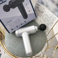 Goddess fascia gun handheld muscle massager in black colour with USB charging port