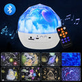 Starry sky projector lamp projecting constellation patterns on bedroom wall