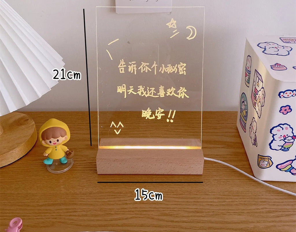 LED bedside lamp with optional message board design on a nightstand.