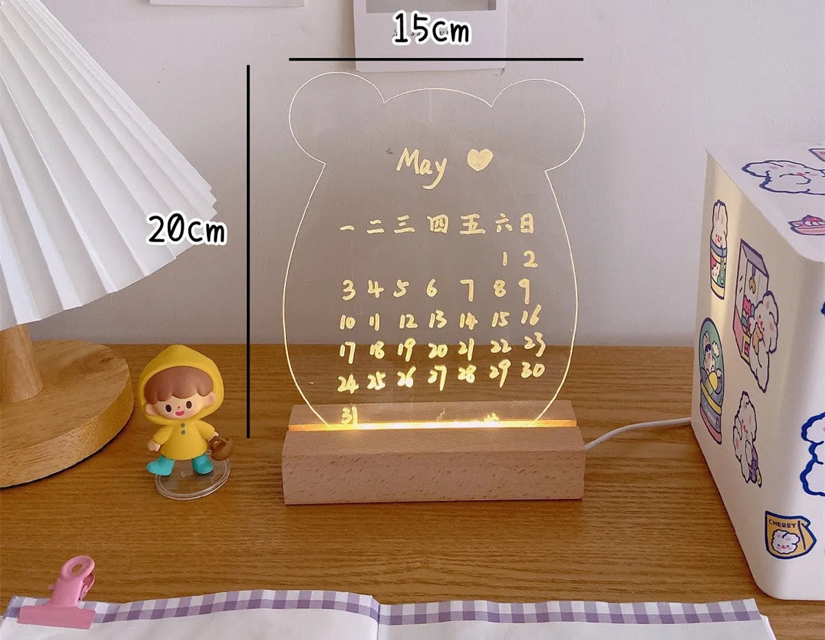 LED bedside lamp with optional message board design on a nightstand.