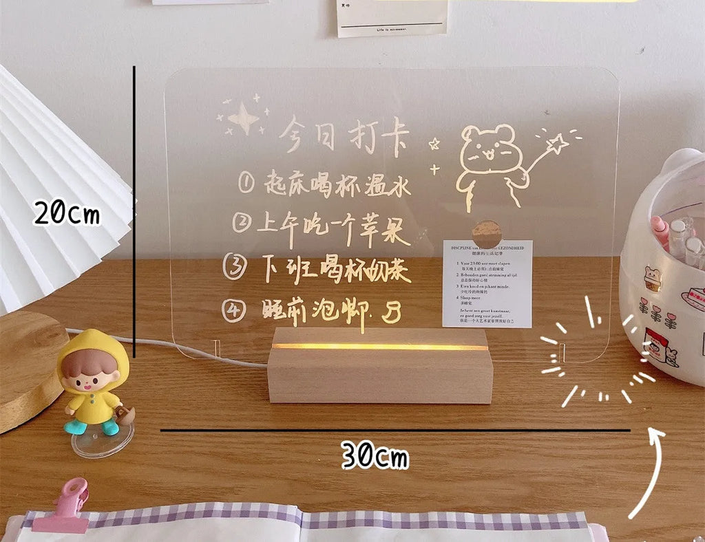 LED bedside lamp with optional message board design on a nightstand.