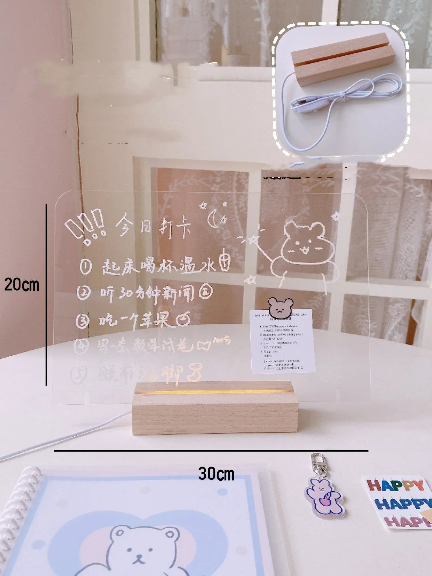 LED bedside lamp with optional message board design on a nightstand.