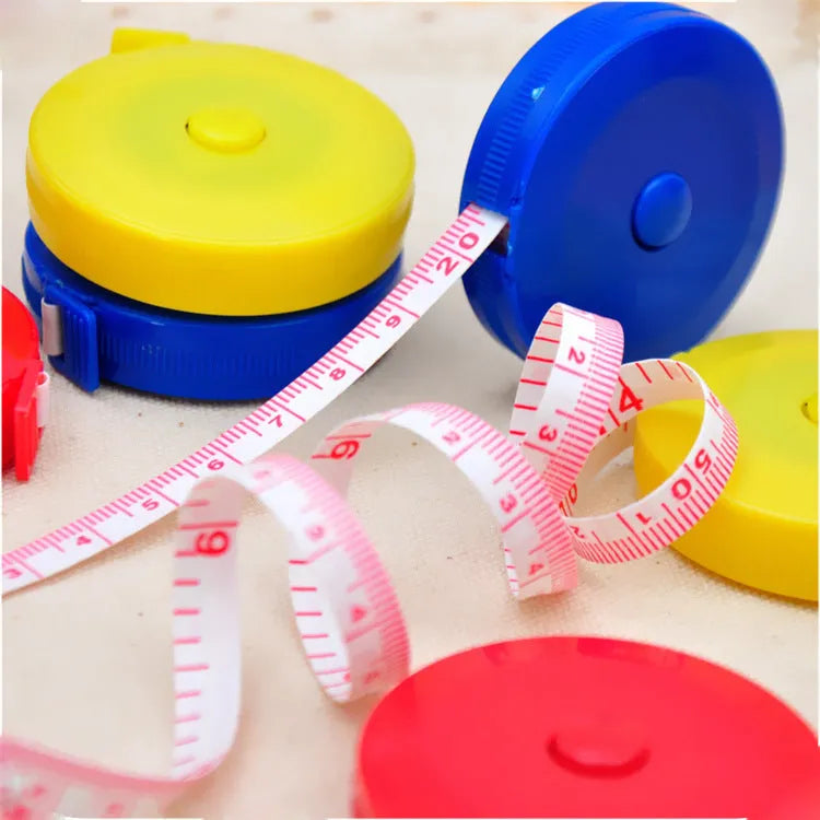 Mini plastic portable measuring tape 150cm with compact 5cm diameter and 1.2cm height