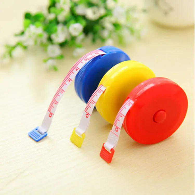 Mini plastic portable measuring tape 150cm with compact 5cm diameter and 1.2cm height