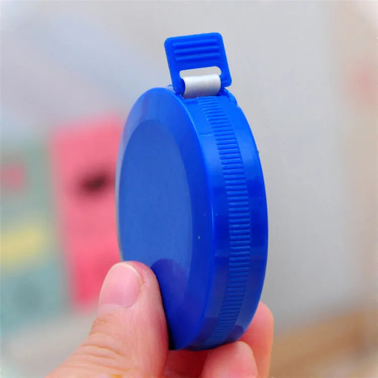Mini plastic portable measuring tape 150cm with compact 5cm diameter and 1.2cm height